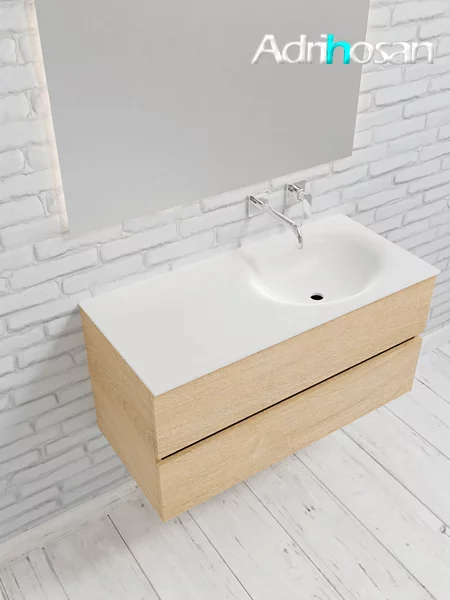 Mueble de baño suspendido Vica 100 Wood roble natural 2 cajones en acabado Wood roble natural mate. Un mueble de baño de apertura suave por uñero con encimera para grifo empotrado y seno derecho.