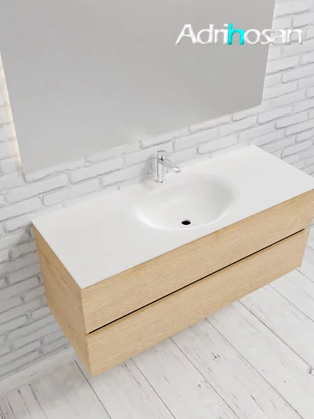 Mueble de baño suspendido Vica 120 Wood roble natural 2 cajones en acabado Wood roble natural mate. Un mueble de baño de apertura suave por uñero con encimera para grifo sobre encimera y seno centrado.